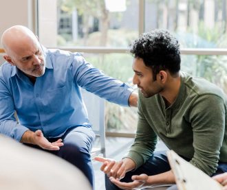Counselor-talking-to-young-man-with-empathy-what-are-the-emotional-triggers-for-empaths